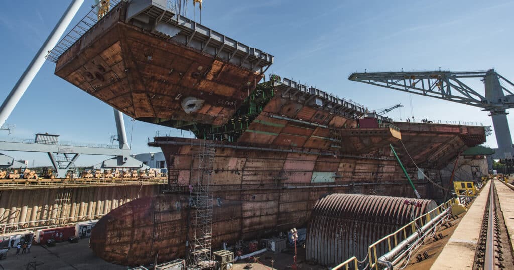 An aircraft carrier under construction. America's shipbuilding industry is a fraction of what it used to be due to China's unfair trade practices.